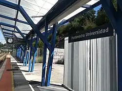 Pontevedra station running in board, clock and platform display