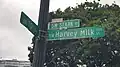 Street signs for both Southwest Stark Street and Southwest Harvey Milk Street, 2022
