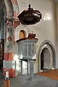Pulpit and probably late 1490s frescos