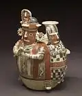 Effigy bottle; 200 BCE 500 CE; earthenware & slip paint; height: 28.2&nbsp;cm (11.1 in.), diameter: 20.5&nbsp;cm (8 in.); Walters Art Museum (Baltimore, USA)