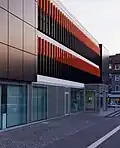 Artinstallation at the outside facade of the headquarter of the Sparkasse Gütersloh–Rietberg, Gütersloh, Fluorescent acrylic glass, 2010, 86 Elements each 120 × 5 × 50&nbsp;cm, side view