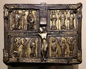 Panel from the Domnach Airgid, an 8th-century wooden reliquary reworked between the 13th and 15th centuries.[65]