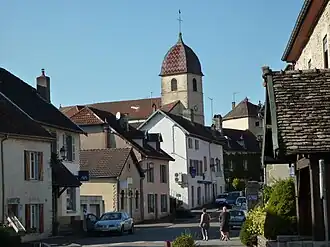 The church and surroundings in Rioz