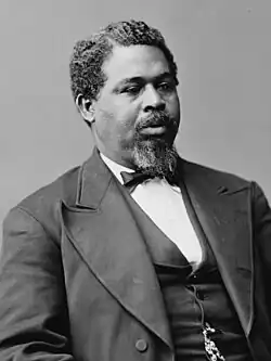Black-and-white portrait of Smalls facing right