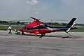 An AgustaWestland AW109 under tow.