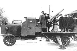 V.V. Tarnovsky (leftmost) at the Guards headquarters with the developers of the first special 76&nbsp;mm anti-aircraft gun, March 1915.