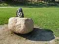 The sculpture on a rock pedestal in 2012.