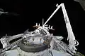 With an extended docking ring Endeavour approaches the ISS.