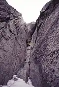 A large chimney high on the route, around pitch 15