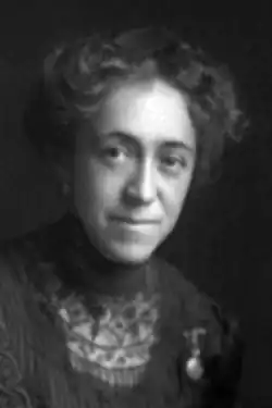 Smiling woman in black-and-white.