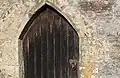 Scratch dial at church gate