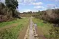 One of the covered aqueducts carrying water between each junction