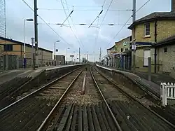Shepreth railway station in 2012, as viewed from the level crossing.