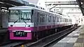 Set 8803 in Shin-Keisei pink corporate livery in March 2016