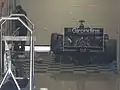 The GD Bordeaux car in its pit garage at Silverstone Circuit (2010)