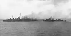 Image 42American destroyers evacuating the crew of HMAS Canberra after the Battle of Savo Island (from History of the Royal Australian Navy)