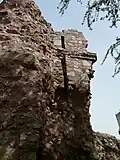 Closeup view of flanking wall of the gate