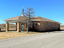 Railroad depot at Slick, later a church and now the Town Hall