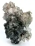 Crystals of slightly pink cobaltoan smithsonite, Tsumeb, 6.8 × 4.6 × 3.7&nbsp;cm