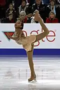 A one-handed Biellmann (Starr Andrews, 2018)