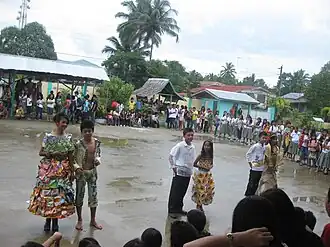 Students presenting their recycled costumes during the celebration of "buwan ng wika"