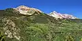 Sunshine Mountain (left) and Wilson Peak from the east