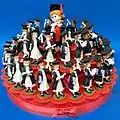 Favor Cake with 40 red carton boxes and figurines of graduates