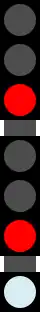 Timed block, timer has not yet run out (top red light flashes when timer is about to run out); next block is timed as well as lunar aspect is indicated (in this example this signal would only clear to yellow over green)