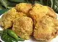 Tahu isi, Indonesian fried tofu filled with vegetable, shrimp, or chicken served with bird eye chili and sweet shrimp paste