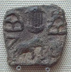 Pandyan Kingdom coin depicting a temple between hill symbols and elephant, Pandyas, Sri Lanka, 1st&nbsp;century&nbsp;CE.
