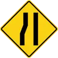 Road narrows on left side