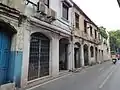 Shophouses along Bamrung Mueang road, Samran Rat intersection is ahead