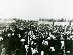 Photo of the crowd exploring the wreckage.