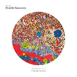 A circle full of multicolored, painted shapes, over a white background.