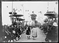 The successful candidates marching past the judges in the Hương exam in Nam Định in 1897