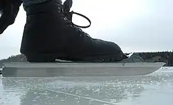 Touring skate with cross country ski bindings and boots