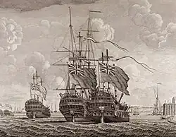 A monochrome image of three large 18th-century war ships flying British flags seen from the rear
