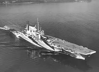 Black and white aerial photo of a warship