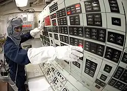 YN2 Nelson Munoz mans Damage Control Console during "general quarters" drill aboard USS Shiloh (CG-67).