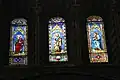 Ulisse De Matteis, Stained-glass windows depicting three Apostles in the drum of the dome of Siena Cathedral, installed in 1888.
