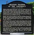 Backside of a plaque outside the Armory