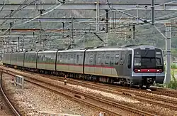 Tung Chung line train entering Sunny Bay station