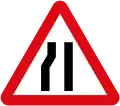 Road narrows on left side