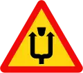 246a: Median strip ahead - pass on either side