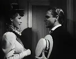 Virginia's flirtatious beauty captivates Biff and holds him tight for years afterward