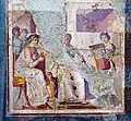 Actress singing, actor playing tibiae, girl playing cithara. Antique fresco in Herculaneum. Tibia appears to be wood or reed-bodied, without raised fingerholes of metal tibiae.