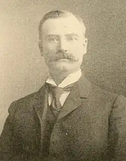 1903 Sepia-toned head and shoulders photo of William B. Mayo turned slightly to his left, looking straight