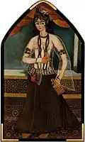 Woman holding a bottle and glass.