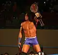 Kenny King with the 2nd design of the X-Division title.