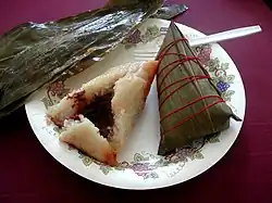 Zongzi rice dumplings, without and with bamboo leaf wrapping